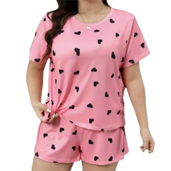 Trendy womens sexy print lounge set featuring a loose short sleeve top and shorts with playful heart patterns, perfect for co...