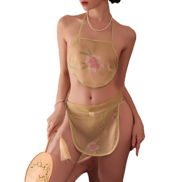 Woman wearing vintage chinese-style belly dance bodice set with floral embroidery, sheer fabric, and matching skirt.