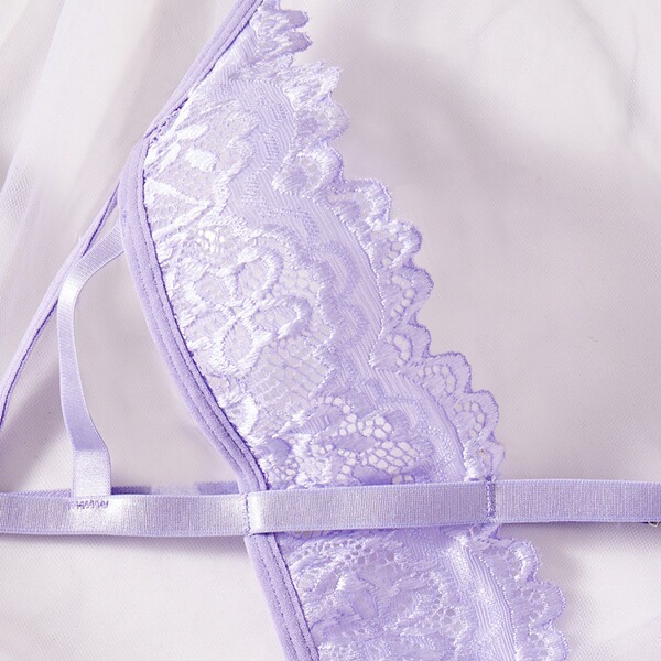 Womens full lace bodysuit featuring delicate lavender lace and sheer fabric, perfect for romantic date nights and special occ...