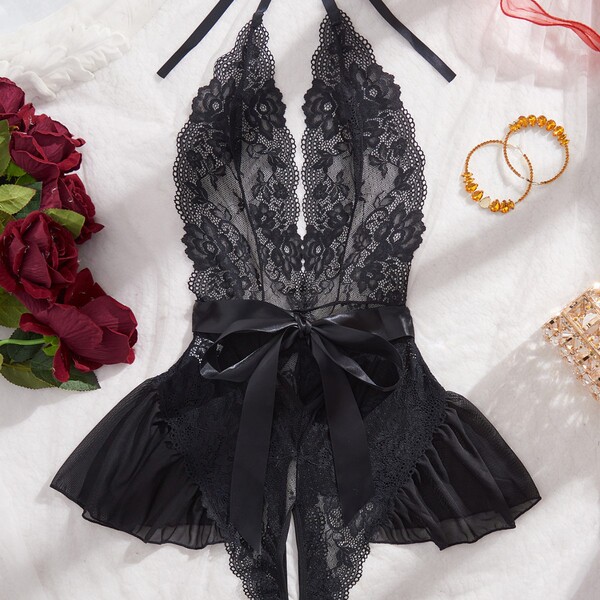 Sexy european-american erotic lingerie featuring a womens full lace sheer bodysuit with deep v-neckline, delicate lace patter...