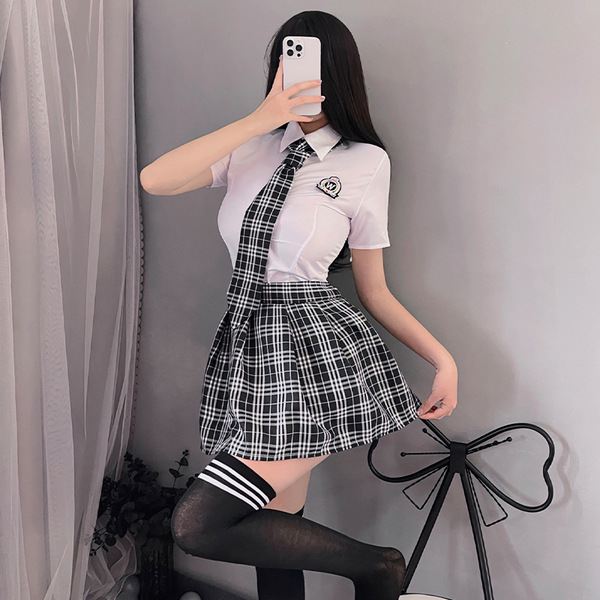 Womens seductive lingerie set - schoolgirl costume outfit, featuring a short plaid skirt, white blouse, and thigh-high stocki...
