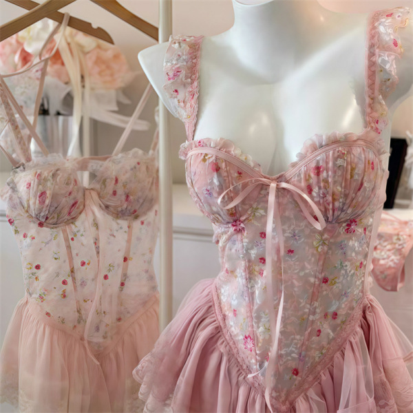 Womens floral lace bra set with push-up padded cups, waist-cinching corset top, and soft pink tulle skirt detail.