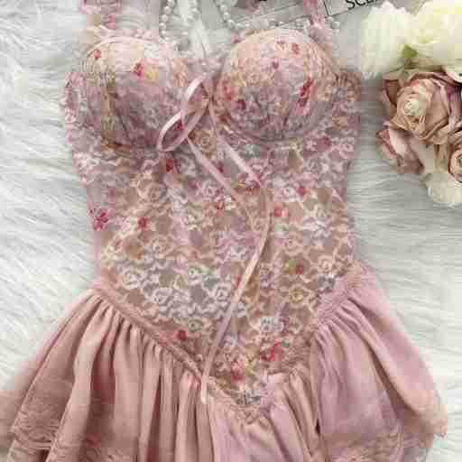 Womens sexy lace bra set - push-up floral corset top with padded cups & waist-cinching design, displayed on a soft white fur ...