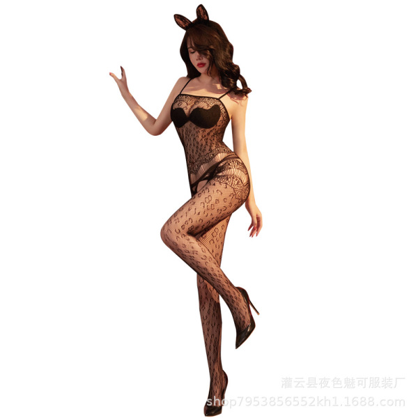 Sexy black lace mesh bodysuit with open-crotch design, sheer tights set, elegant european style, worn by woman posing confide...