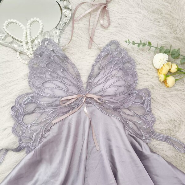 Lavender butterfly-wing sleep dress with bow backless cutout, sexy summer ice silk lounge set on fluffy white rug.