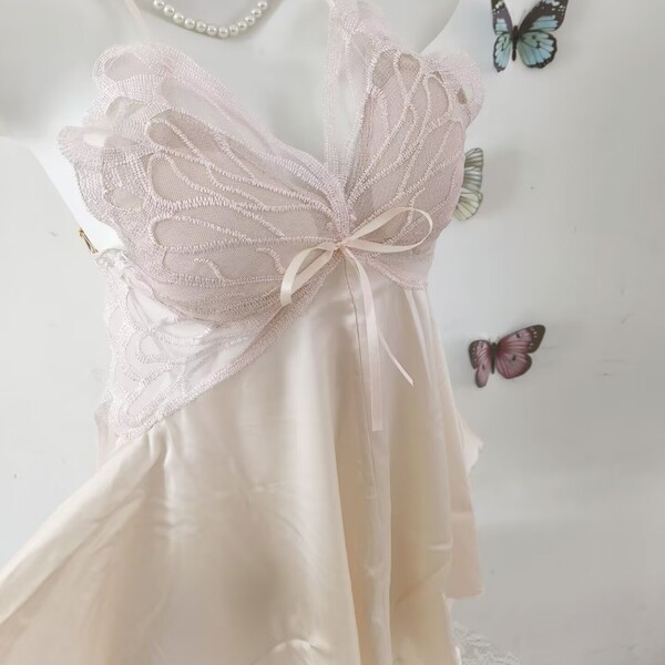Pink butterfly-themed sleep dress with bow and backless cutout, perfect for summer lounging.