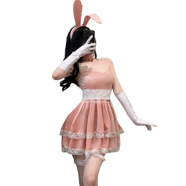Sexy bunny costume set featuring a pink dress with lace details, bunny ears, and festive design perfect for holiday parties a...