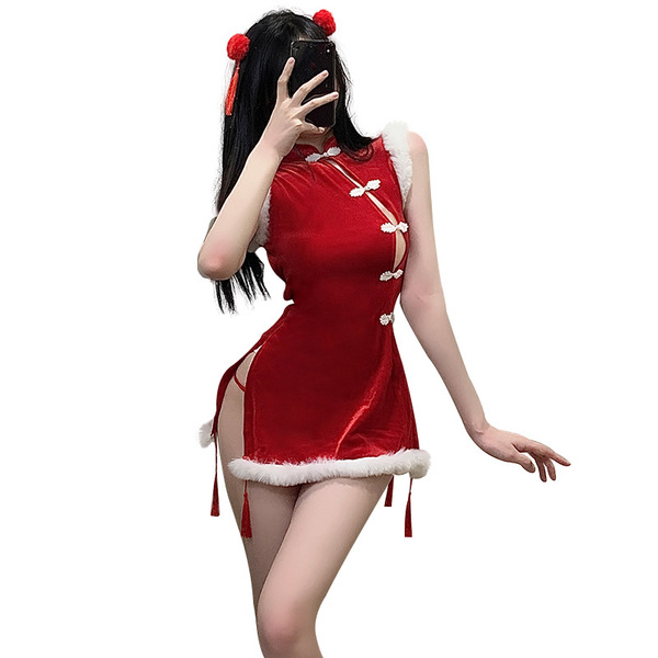Red festive cheongsam with sheer bust design, perfect for holiday celebrations. features tassels and buttons for a classic to...