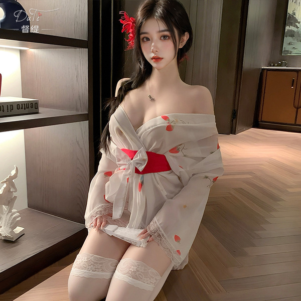 A woman models a sheer kimono-inspired uniform with floral patterns, featuring lace details and a red sash, perfect for intim...