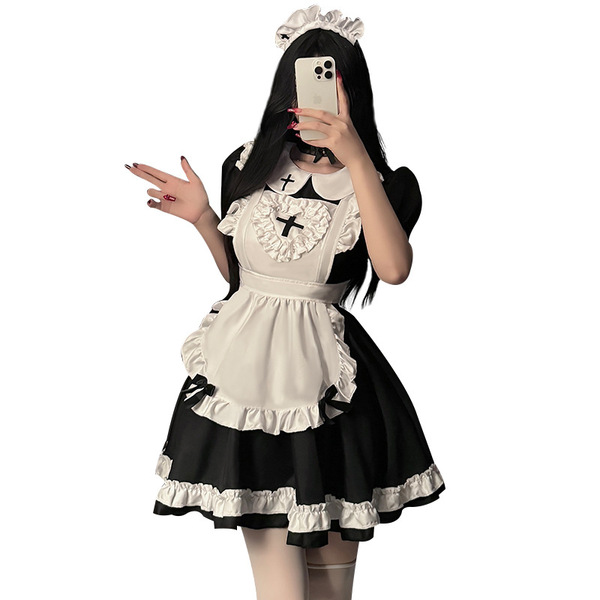 A woman wearing a black and white maid costume with ruffles, perfect for cosplay or anime role play outfits.