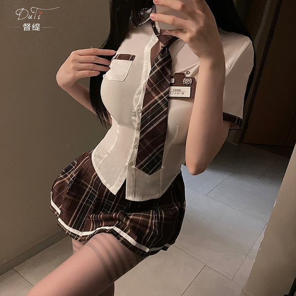 Sexy jk outfit featuring a white blouse with tie, plaid skirt, and thigh-high stockings, perfect for cosplay or evening wear.