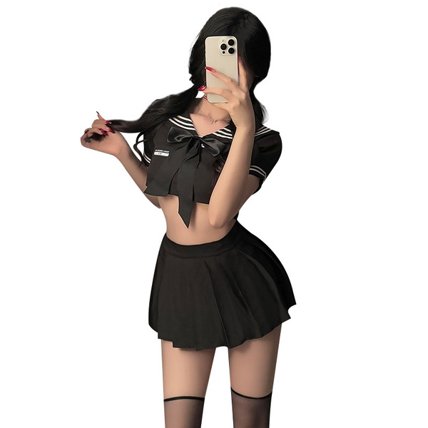 A woman models the xianyi sexy lingerie skirt, featuring a schoolgirl style with pleated mini skirt design, perfect for passi...