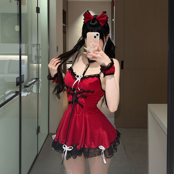 A person wearing a red xishi seductive lingerie set, featuring a cute maid costume with lace details and bows, taking a mirro...
