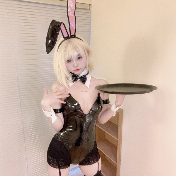 A blonde cosplayer wearing a black pvc bunny-themed lingerie set with lace-up details, holding a tray. perfect for anime cosp...