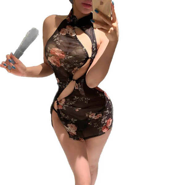 Woman wearing yeqin nu vintage-inspired sheer cheongsam lingerie set with high slit, holding phone and fan.