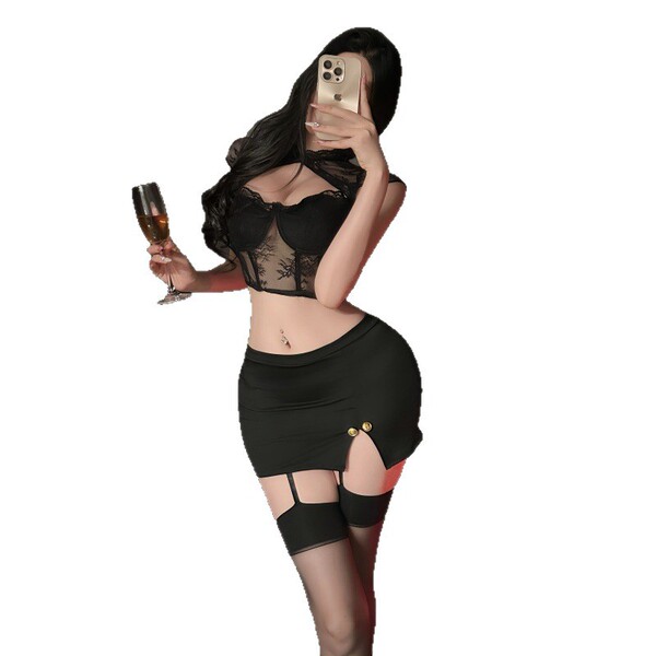 A woman poses with a champagne glass, wearing a black lace bodysuit set featuring a fishbone corset and bodycon skirt, exudin...