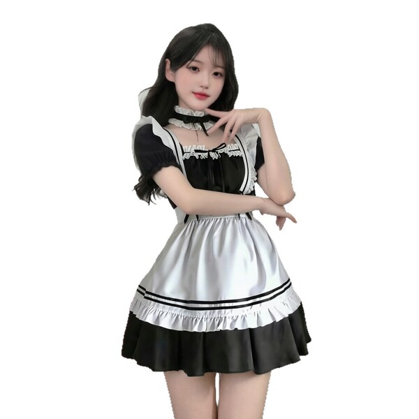 A woman wearing a yimenglan maid costume dress, featuring black and white colors with ruffled details, perfect for japanese l...