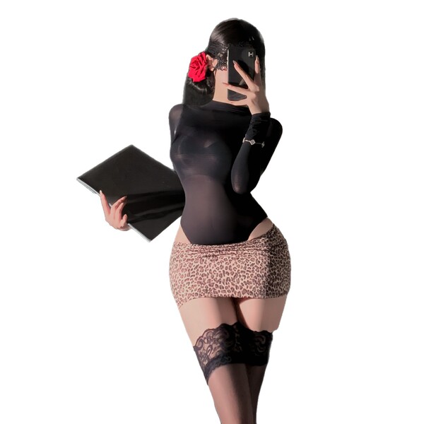 Woman in yuedie ol-style bodycon dress with lace stockings, holding a folder and wearing a red flower in her hair.