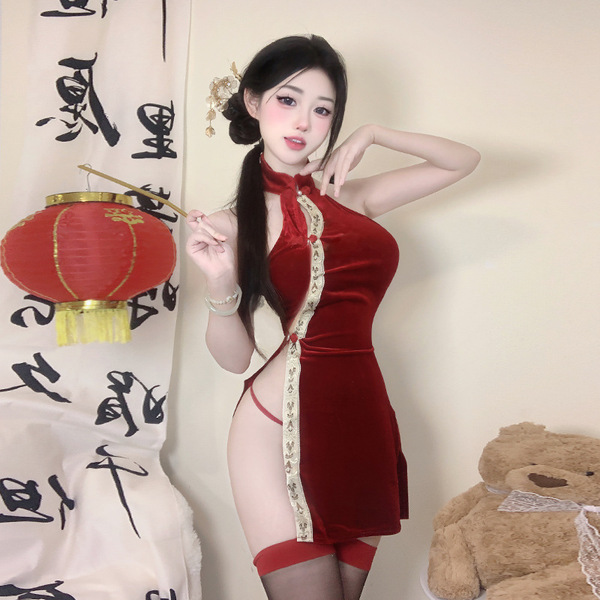 A woman poses elegantly in a zimei red silk velvet chinese-style lingerie set, featuring traditional knotted buttons and shee...
