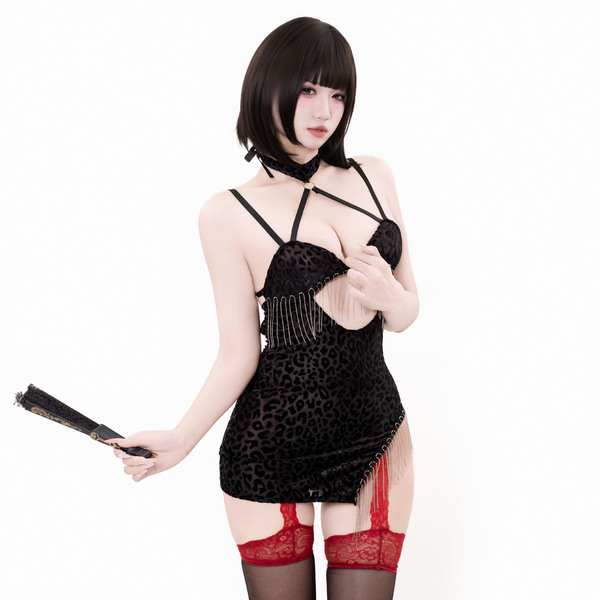 Sexy black leopard print dress with fringe details and backless design, perfect for summer outfits.