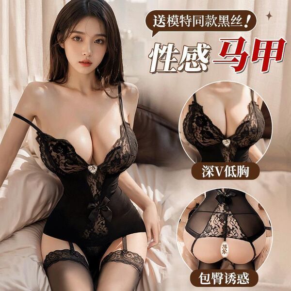 Woman modeling black lace teddy sleep dress with sheer mesh, adjustable straps, and matching bra set.