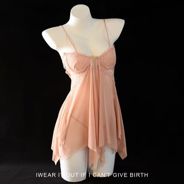 Soft pink lace chemise with underwire push-up cups and flowing skirt on mannequin.