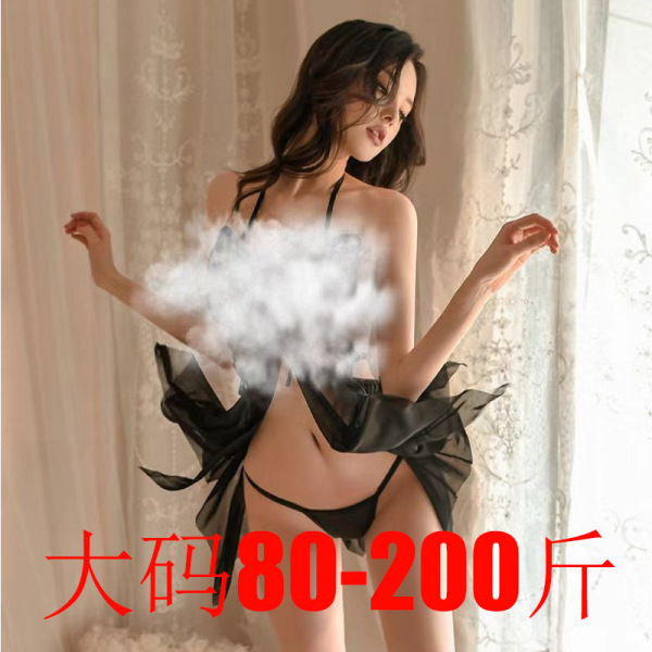 Curvy woman wearing a black sheer mesh butterfly halter nightgown with lace details and backless design, perfect for plus siz...