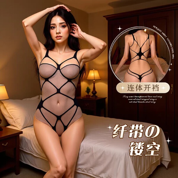 A woman poses in a sheer mesh bodysuit with open crotch design, featuring lace detailing and intricate patterns.