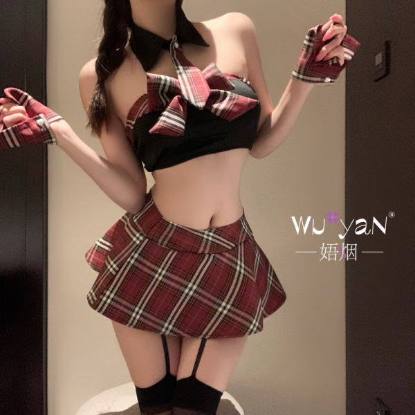 Woman wearing red plaid pure & seductive lingerie set with bow top, mini skirt, and thigh-highs in sexy qqny jk style.
