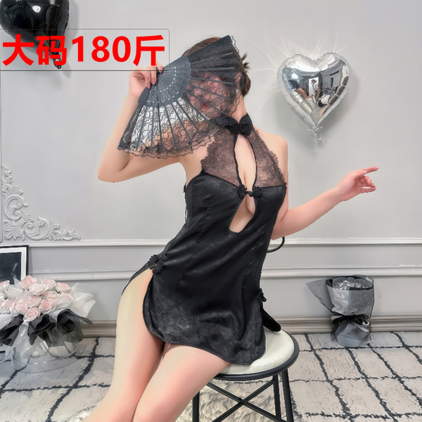 Woman wearing black retro lace cheongsam lingerie set with sheer mesh backless design, holding a fan, seated on stool in eleg...
