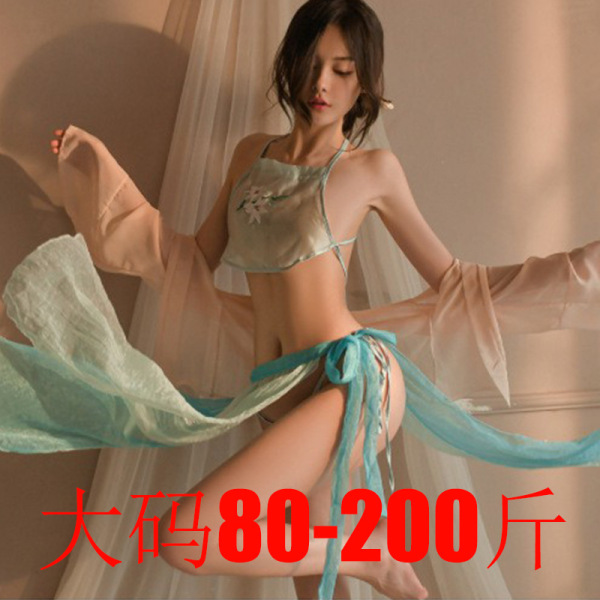 Model wearing a sheer, modern guofeng-inspired hanfu belly dance top and matching wrap skirt set with flowing sleeves.