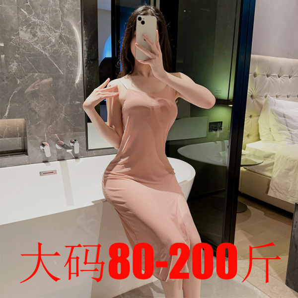 Woman in pink plus size lingerie set, 80-200 lbs, posing in bathroom with phone selfie.