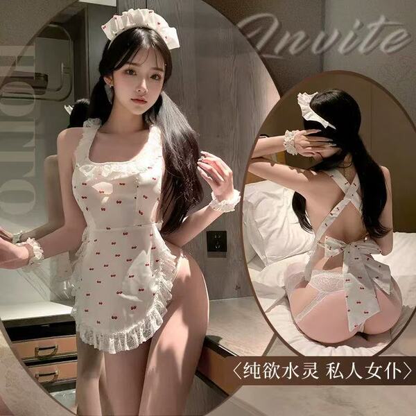 Woman wearing cherry lace maid costume with sexy backless apron, cheeky cut-outs, and sheer trim.