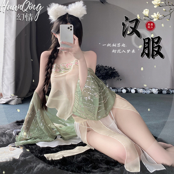 A woman poses in a vintage-inspired silk-look chemise set, featuring floral lace and seductive design elements, perfect for r...