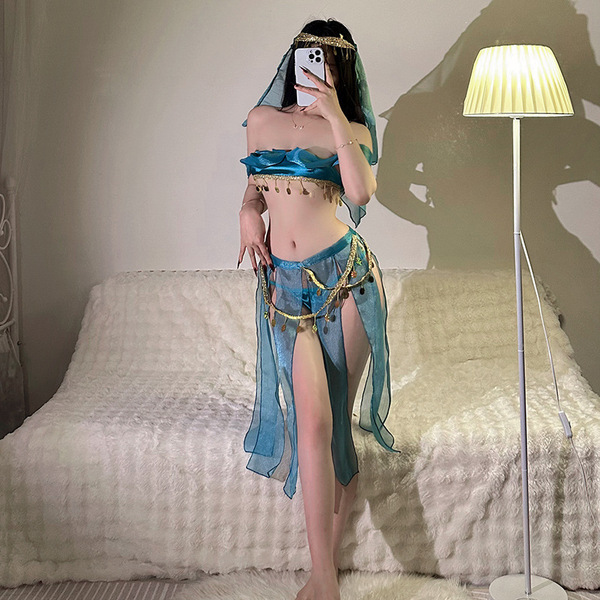 A woman poses in an exotic dance-inspired sleep set featuring a blue bodice and flowing nightgown, embodying ancient chinese ...