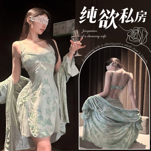 Woman in elegant green lace print chemise with garter belt, holding wine glass, showcasing seductive silk-feel lingerie set.