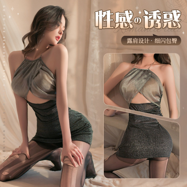 Woman modeling manyan sexy ol uniform set with strapless shiny skirt and cutout top, perfect for confident nightclub style.