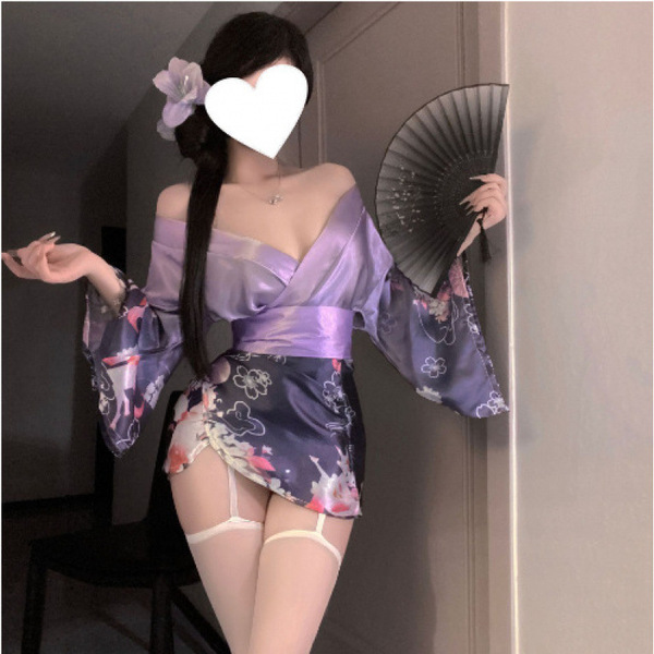 A woman poses in a purple naben temptation sexy deep v kimono lingerie set, featuring an open front design with floral patter...