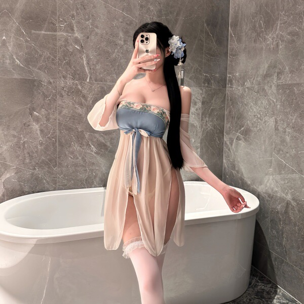 Elegant night dress featuring flowing tassels and soft vintage hanfu-inspired design, perfect for a romantic ambiance.