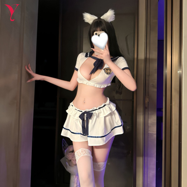 Woman modeling nightsiren sweet-spicy sailor uniform set with white mini skirt, crop top, thigh-highs, and bunny ears.