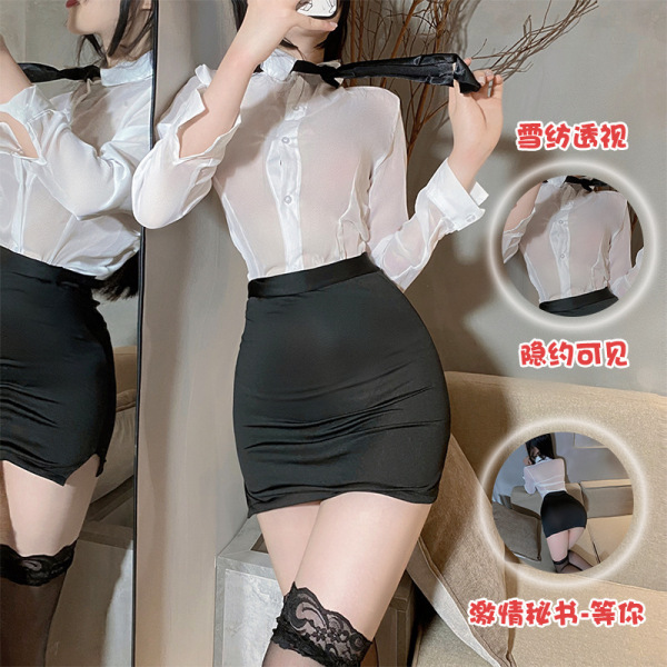 Woman wearing a plus size seductive office outfit featuring a sheer white blouse and black secretary skirt with lace stocking...