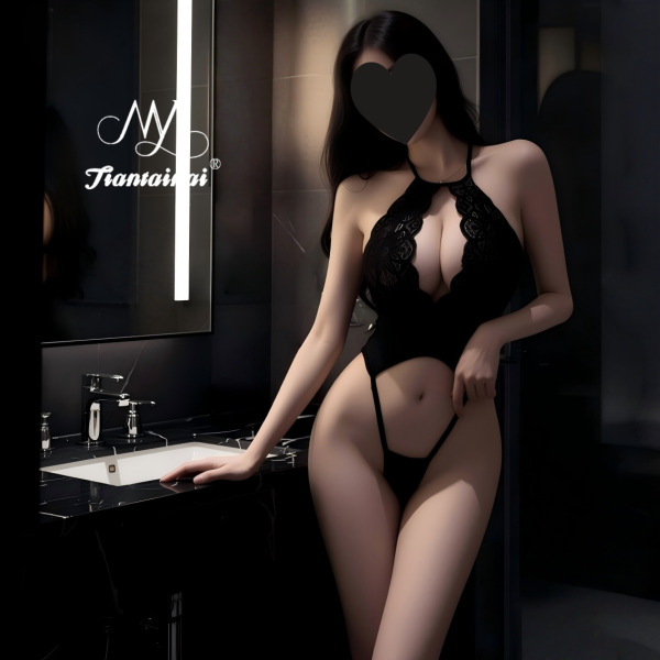 Woman in black lace bodysuit set, elegant and seductive sleepwear with no-remove design for intimate moments.
