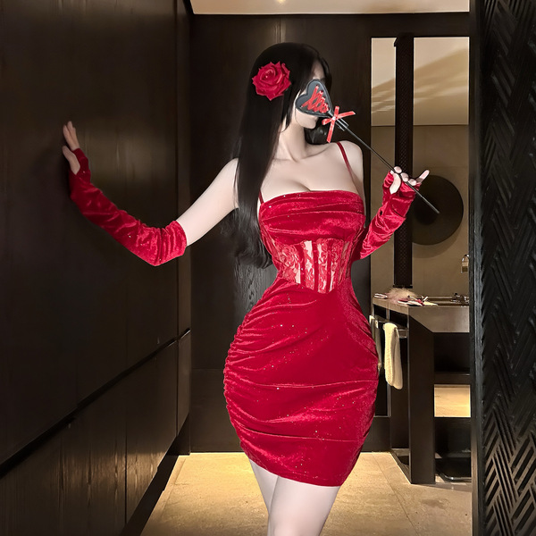A woman poses elegantly in a qingshe red velvet sexy new year outfit, featuring a sheer lace bodycon dress with a sparkling b...