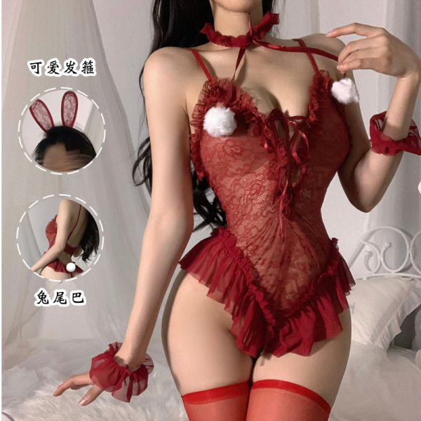 Woman modeling red lace bunny lingerie set with sheer bodice, ruffled skirt, matching choker, wrist cuffs, and thigh-high sto...