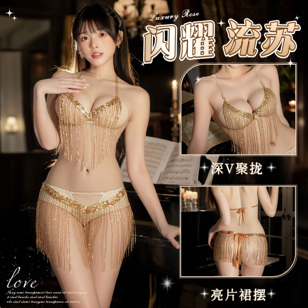 Woman modeling a gold shimmering tassel sheer dancer costume, featuring a deep v bra and open-crotch thong with g-string.