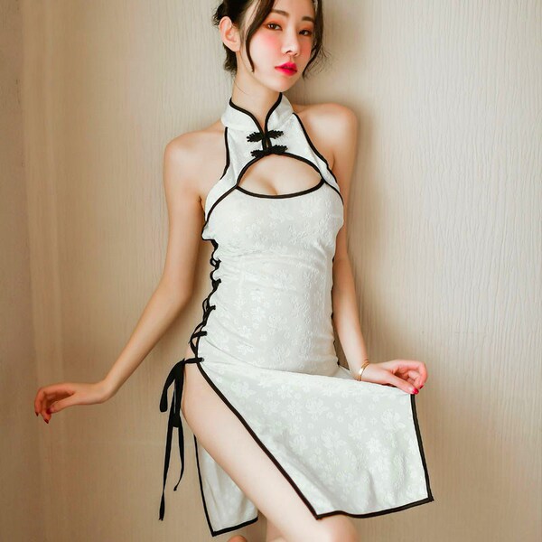 Vintage-inspired lace cheongsam lingerie featuring side slit, seductive binding, and intricate cut-out design.