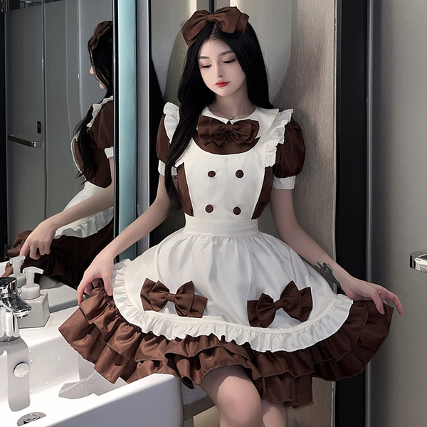 A woman poses in a maid lolita outfit, featuring a cream and brown dress with ruffles, bows, and buttons, perfect for anime-t...