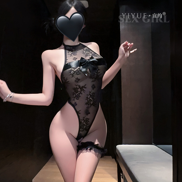 Woman modeling yiyue black lace bodysuit with bow detail, elegant french-style lingerie for sensual nightwear.