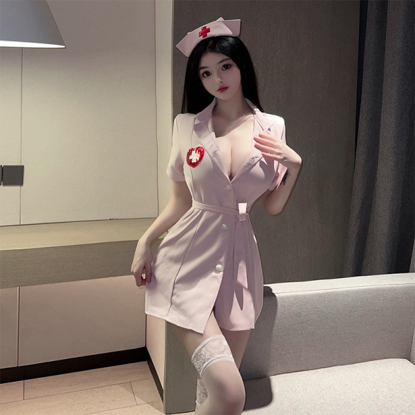 Sexy nurse costume set with deep v neckline, pink dress, white stockings, and red cross hat for role play & adult fun.