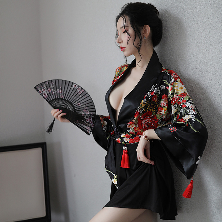 A woman poses elegantly in a black japanese anime-themed sheer kimono-inspired sleepwear set, featuring floral patterns and c...